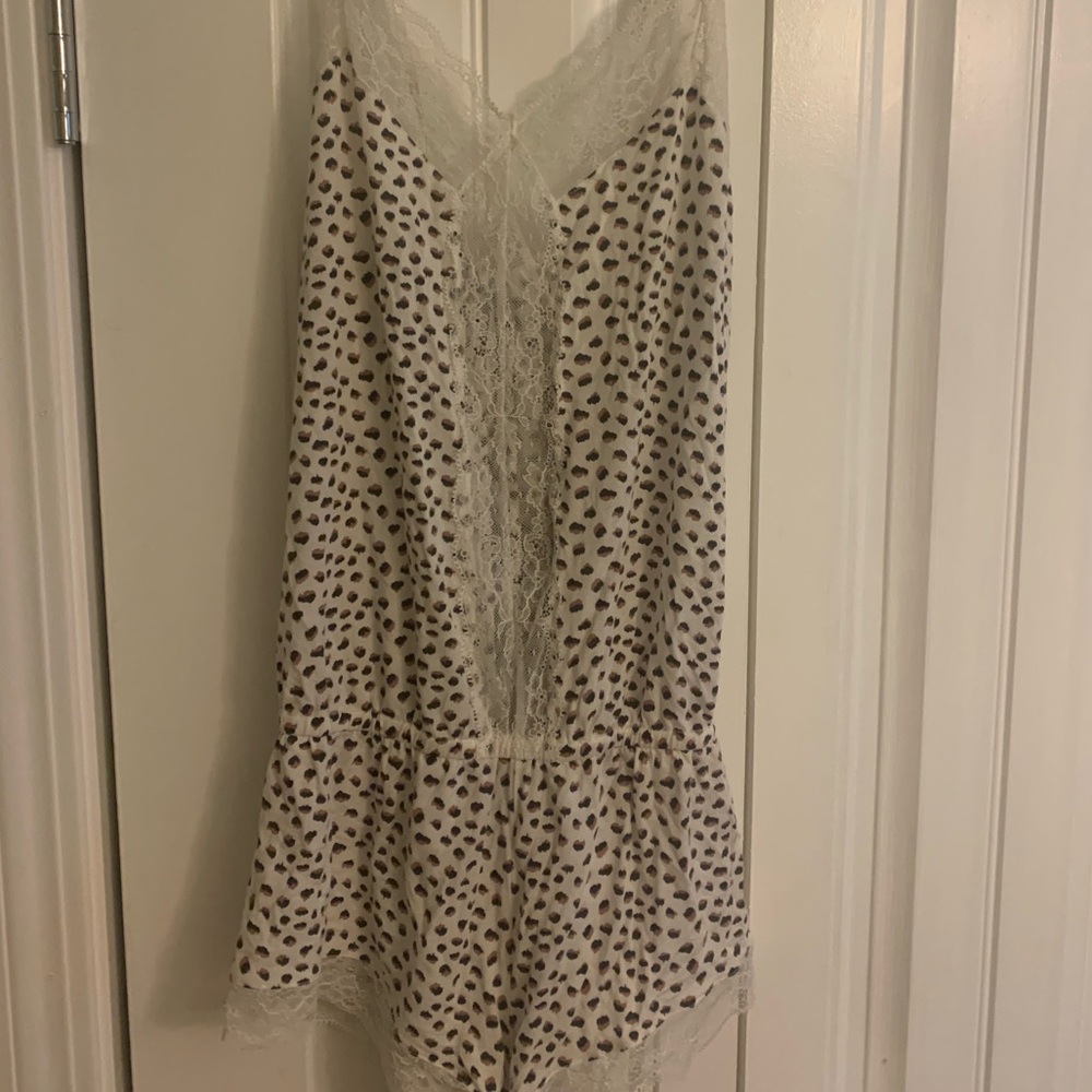 Eberjay leopard onesie. Size medium. Never worn!